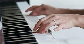 woman playing the piano